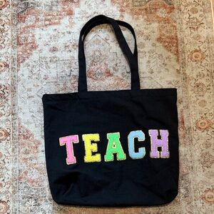 Black Tote Bag with Colorful 'TEACH' Design